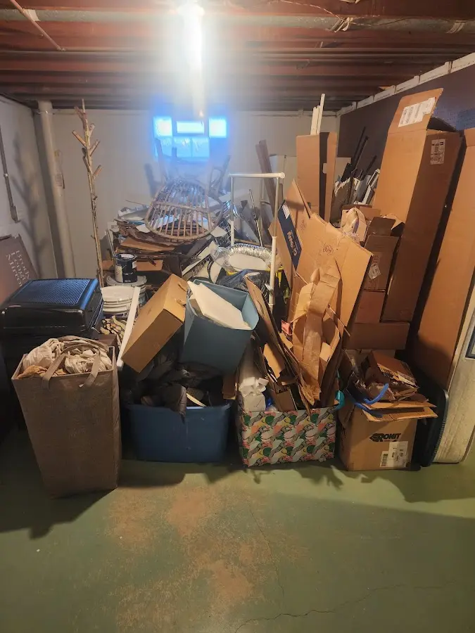 Roll-off dumpster container at job site for Concrete Dumpster Rental in Northborough